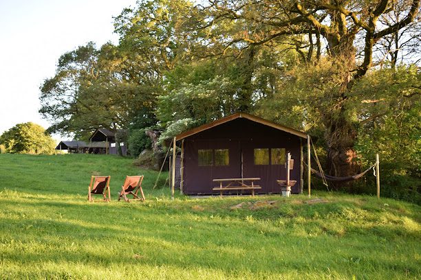 Un Lit au Pre La Ferme de Penquelen Huella à Scaer